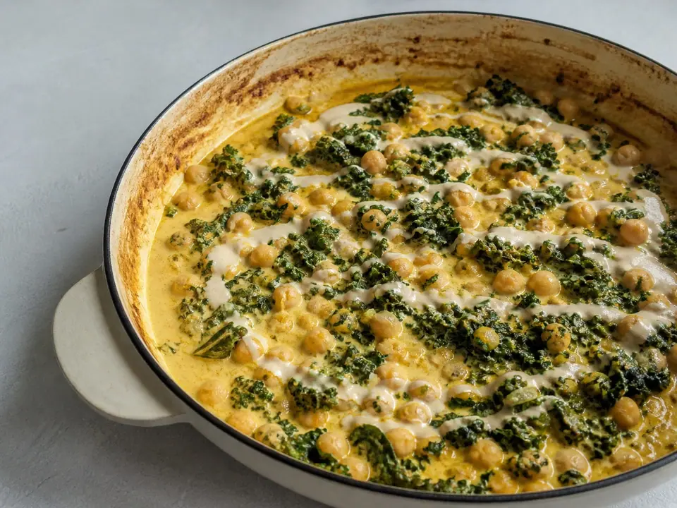 Coconut chickpea curry with greens and lemon tahini