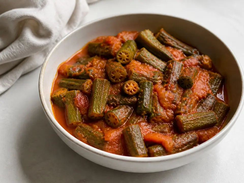 Okra tomato masala with fresh coriander and lemon after reheating