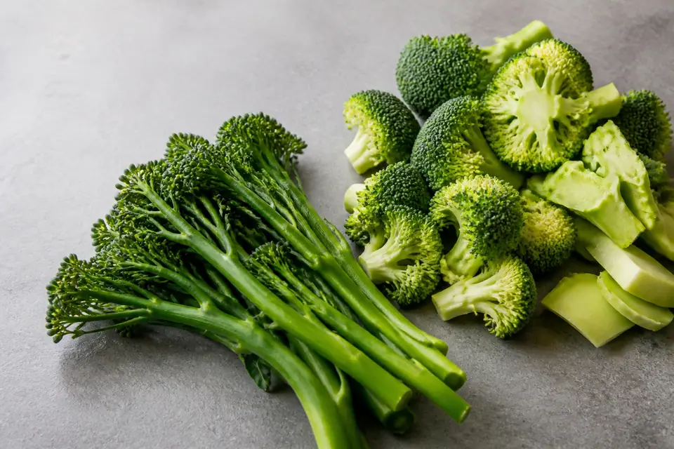 Tenderstem broccoli and regular broccoli arranged side by side on a tray